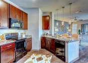 Thumbnail 10 of 24 - model kitchen overview at Creekside at Providence, Tennessee, 37122
