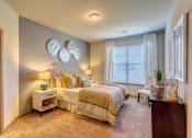 Thumbnail 16 of 24 - model guest bedroom at Creekside at Providence, Tennessee
