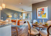 Thumbnail 13 of 24 - model dining room and living room at Creekside at Providence, Tennessee