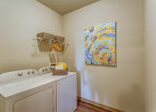Thumbnail 20 of 24 - model laundry room with washer and dryer at Creekside at Providence, Mt Juliet