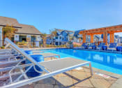 Thumbnail 8 of 24 - pool with tanning ledge at Creekside at Providence, Tennessee