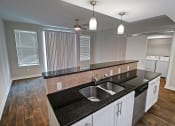 Thumbnail 11 of 29 - Renovated Adams Kitchen and Living Room