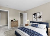 Thumbnail 6 of 12 - A bedroom with a large bed and a wooden dresser at Rose Hill Estates, Norwich, CT, 06360