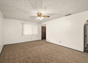Thumbnail 11 of 12 - Livingroom at Scottsmen Apartments, Clovis, 93612