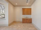 Thumbnail 47 of 94 - A Kitchen with a Marble Floor at The Villas at Ellis Manor, California, 93720