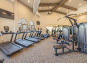 Thumbnail 75 of 94 - A Gym with Elliptical Machines at The Villas at Ellis Manor, Fresno, CA, 93720