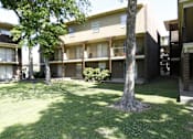 Thumbnail 2 of 10 - Grassy Area at Cleary Pointe Apartments, Metairie, LA