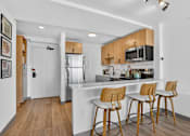 Thumbnail 8 of 33 - Fully Equipped Kitchen With Modern Appliances at Reflections at the Wharf, Washington, DC
