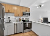 Thumbnail 10 of 33 - Contemporary Kitchen at Reflections at the Wharf, Washington