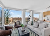 Thumbnail 11 of 33 - Bright Living Room at Reflections at the Wharf, District of Columbia