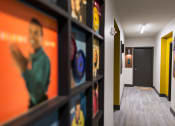 Thumbnail 40 of 52 - hallway with record albums on wall at Pinnex, Indianapolis, IN, 46203