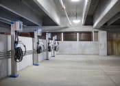 Thumbnail 33 of 33 - car recharging stations in garage at 747 Apartments, Indianapolis, 46202