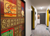 Thumbnail 21 of 52 - hallway with wall art at Pinnex, Indianapolis