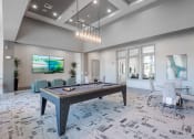 Thumbnail 21 of 43 - a game room with a ping pong table at Discovery at Craig Ranch, McKinney, 75070