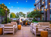 Thumbnail 32 of 37 - Outdoor courtyard with fire pit at Penn Circle, Indiana, 46032