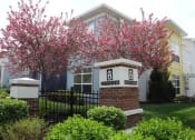 Thumbnail 19 of 28 - flowering trees behind pillar at CityView, Missouri, 64116