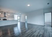 Thumbnail 38 of 43 - Spacious room with wooden floor at 747 Apartments, Indianapolis