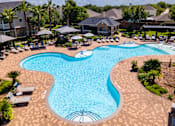 Thumbnail 41 of 47 - Blue Cool Swimming Pool at Avenues at Shadow Creek Ranch Apartments, Pearland, Texas