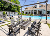 Thumbnail 24 of 44 - Poolside Area with Fire Pit at Butternut Ridge Apartments, North Olmsted