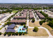 Thumbnail 39 of 43 - an aerial view of a neighborhood with houses and a swimming pool at Discovery at Craig Ranch, McKinney, TX