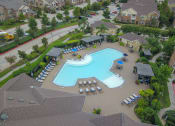 Thumbnail 8 of 84 - Drone View Of Pool at Grand Villas Apartments, Katy