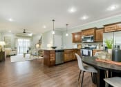 Thumbnail 8 of 46 - Dining With Kitchen at Prairie Pines Townhomes, Shawnee, Kansas