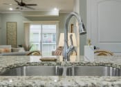Thumbnail 2 of 46 - Stainless Steel Sink With Faucet In Kitchen at Prairie Pines Townhomes, Shawnee, KS, 66226