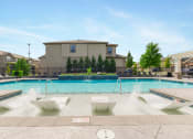 Thumbnail 37 of 46 - Swimming Pool With Relaxing Sundecks at Prairie Pines Townhomes, Shawnee