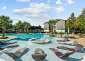 Thumbnail 15 of 49 - Pool And Sundecks at Discovery at Kingwood, Kingwood, 77339