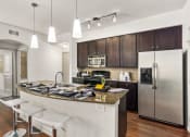 Thumbnail 36 of 49 - Island Kitchen at Discovery at Kingwood, Kingwood, 77339