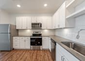 Thumbnail 48 of 100 - Kitchen with White Cabinets at Edge 35 Apartments, Indianapolis, 46203