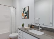 Thumbnail 26 of 100 - Bathroom with White Toilet at Edge 35 Apartments, Indianapolis, 46203