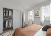 Thumbnail 27 of 100 - Bedroom with Large Bed at Edge 35 Apartments, Indianapolis, Indiana