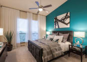 Thumbnail 17 of 24 - Bedroom With Ceiling Fan at Imperial Lofts, Sugar Land, TX, 77498