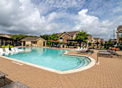Thumbnail 29 of 47 - Large outdoor swimming pool at Grand Villas at Cinco Ranch, Katy, Texas