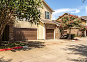 Thumbnail 45 of 47 - Residential area with houses and trees at Grand Villas at Cinco Ranch, Katy