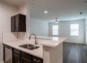Thumbnail 25 of 47 - Kitchen with sink at Grand Villas at Cinco Ranch, Katy, Texas