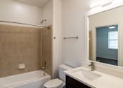 Thumbnail 26 of 47 - Bathroom with sink and mirror at Grand Villas at Cinco Ranch, Texas