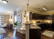 Thumbnail 4 of 47 - Kitchen with island at Grand Villas at Cinco Ranch, Texas, 77494
