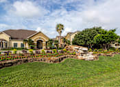Thumbnail 47 of 47 - Landscape of the property at Grand Villas at Cinco Ranch, Katy, Texas