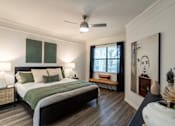 Thumbnail 17 of 47 - Bedroom with a lamp at Grand Villas at Cinco Ranch, Katy