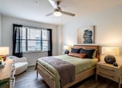 Thumbnail 15 of 47 - Bedroom with ceiling fan at Grand Villas at Cinco Ranch, Texas