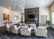 Thumbnail 35 of 47 - Clubhouse with white chairs at Grand Villas at Cinco Ranch, Texas, 77494