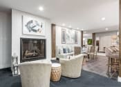 Thumbnail 33 of 61 - sitting area in front of fireplace at The Greyson, Hilliard, OH