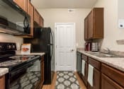 Thumbnail 43 of 61 - black appliance in kitchen in apartment at The Greyson, Hilliard, OH