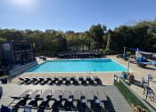 Thumbnail 6 of 21 - swimming pool area with chairs at The Boulevard, Roeland Park, KS