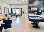 Thumbnail 3 of 38 - a living room with a pool table and a tv at Waterstone at Cinco Ranch, Katy, TX, 77450