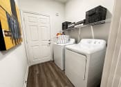 Thumbnail 7 of 84 - our apartments have a laundry room with a washer and dryer at Grand Villas Apartments, Katy