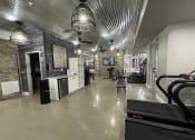 Thumbnail 26 of 63 - a view of the inside of a gym with a treadmill and other gym equipment at Edge 35, Indianapolis