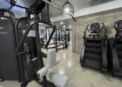 Thumbnail 25 of 63 - a gym with cardio equipment and a treadmill at Edge 35, Indianapolis